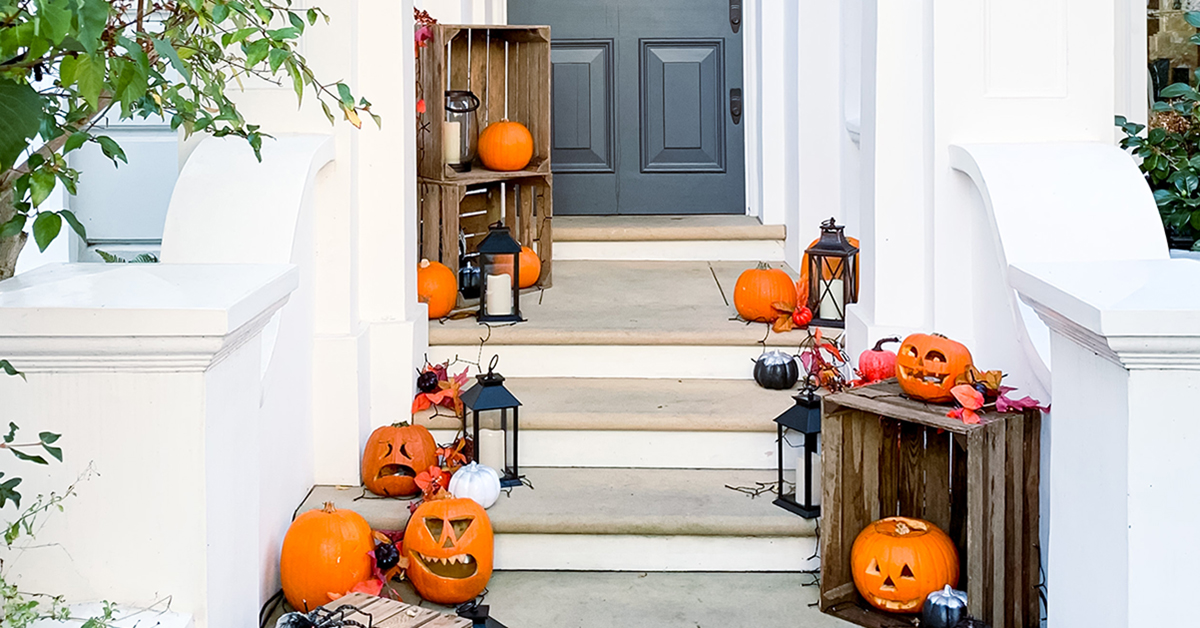 Pumpkins on the front porch of a home