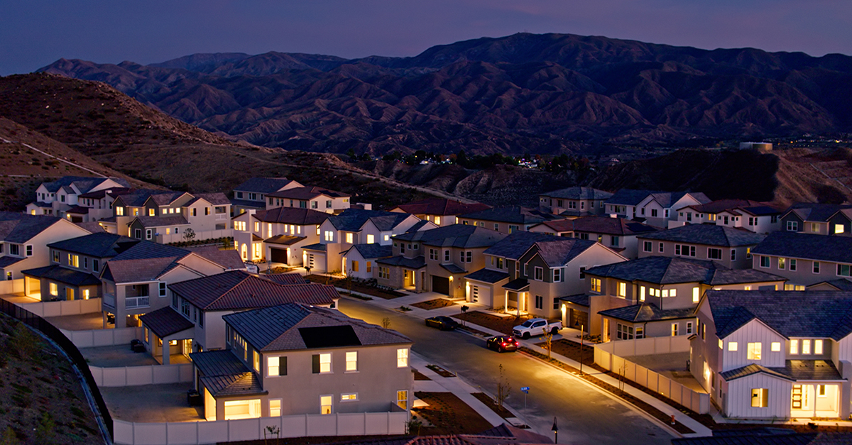 A street of LA homes at night