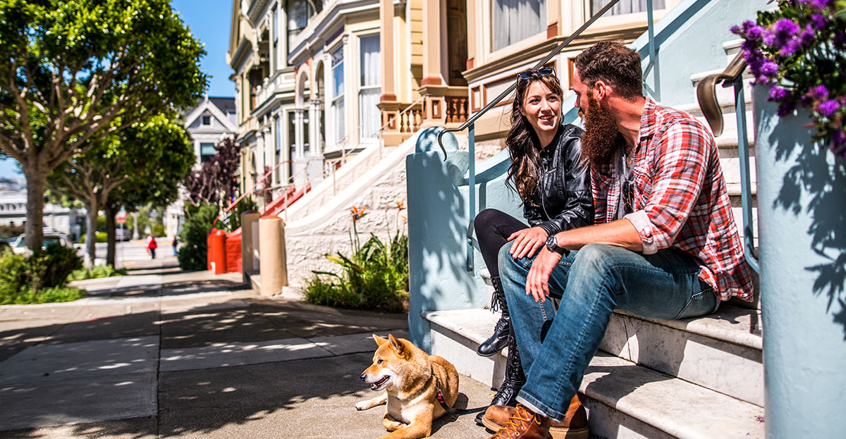 A San Francisco couple sitting on their front porch